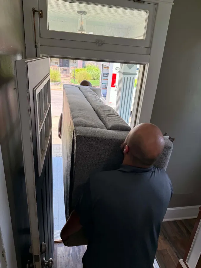 Ready Now Anytime team carefully moving household items