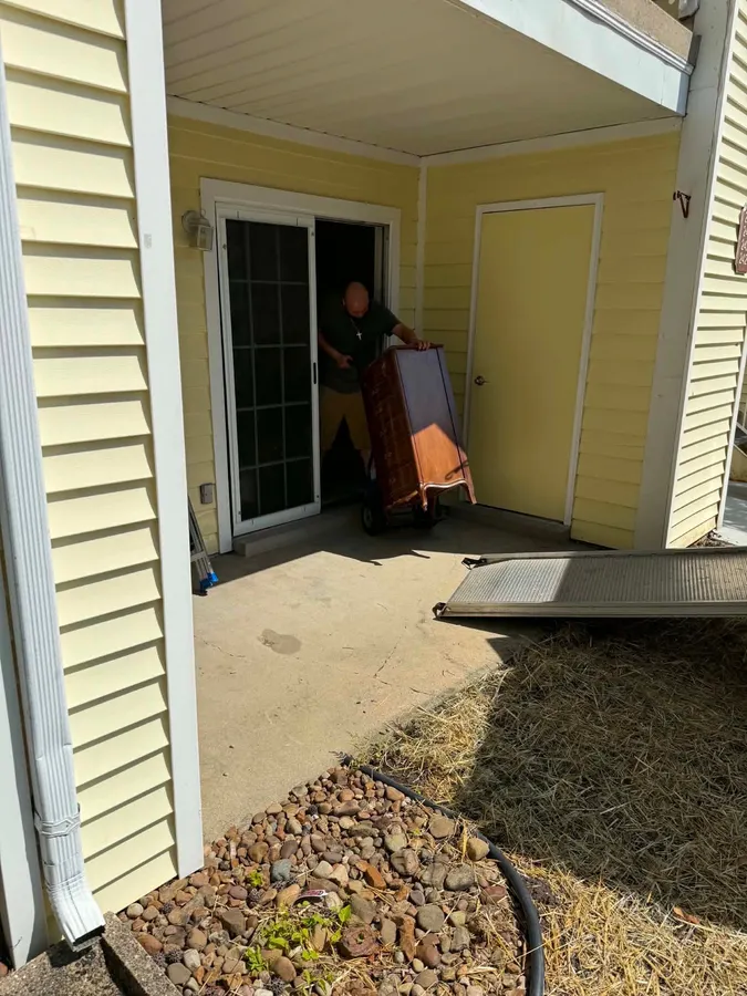 Ready Now Anytime team carefully moving household items