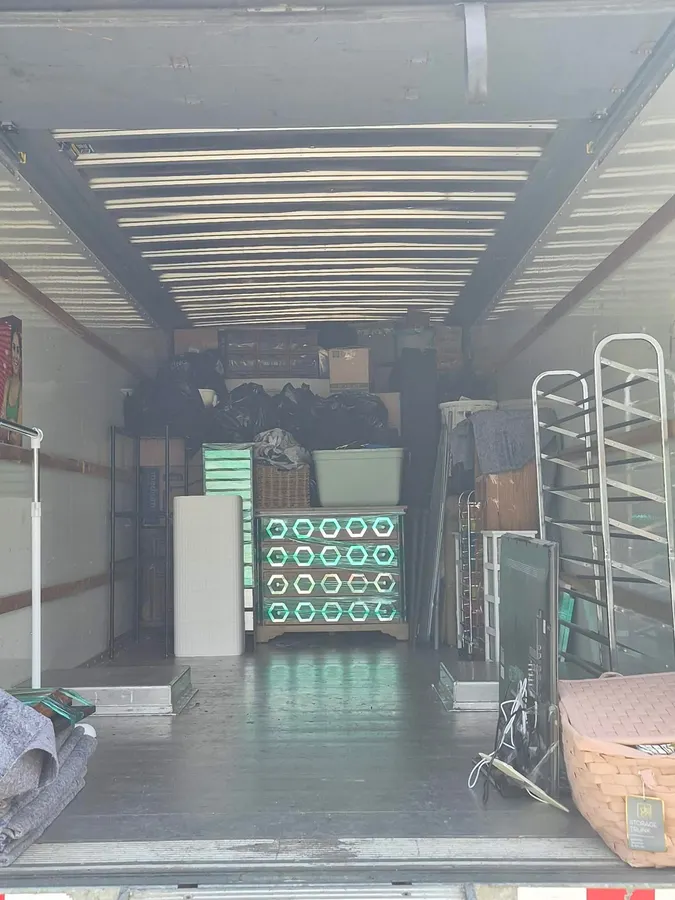 Ready Now Anytime team carefully moving household items