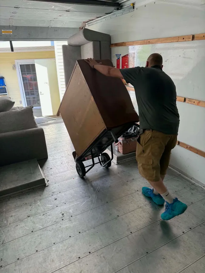 Ready Now Anytime team carefully moving household items