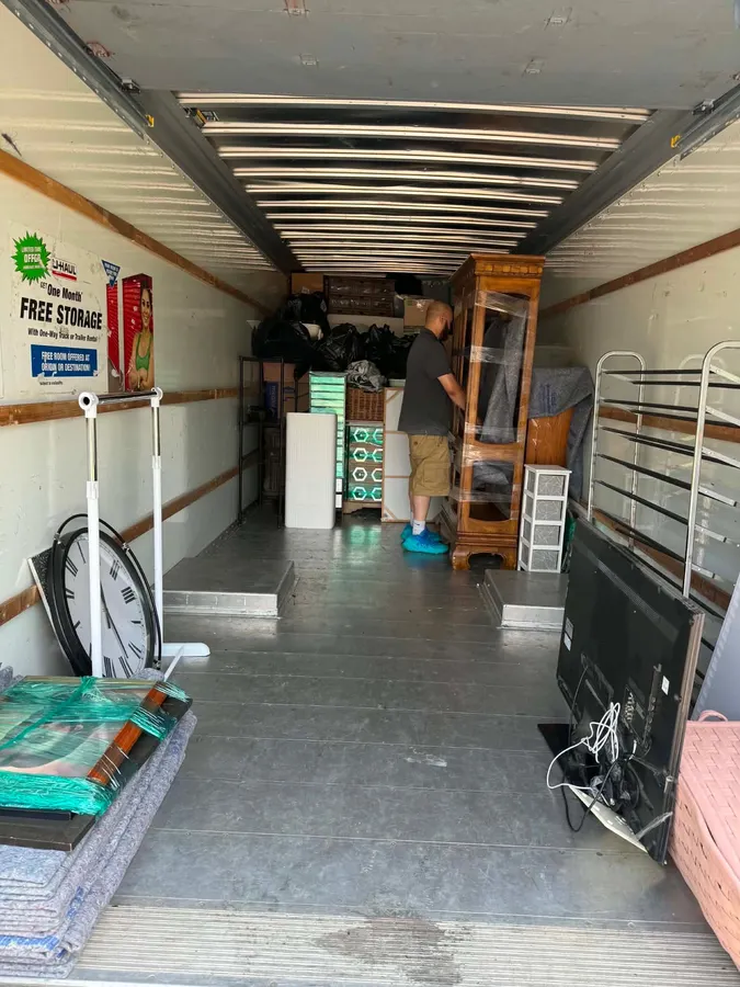Ready Now Anytime moving crew handling household furniture